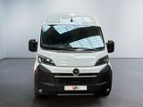 a white van that is parked in a room