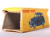 a small box with a toy truck inside of it