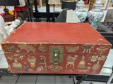 a red box sitting on top of a table