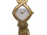 l'image d'une montre-bracelet de femme entourée d'une chaîne