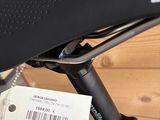 a bike with a price tag attached to it ' s seat