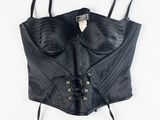 a black leather corset with laces on it