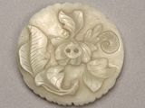 a picture of a white flower on a white plate