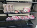 a lot of different items on the shelves in the store
