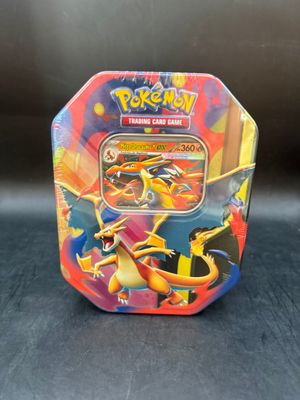 a close up of a box of pokemon trading cards on a table