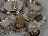 a lot of silver items that are on the table