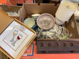 a box full of assorted items sitting on a table