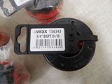 a close up of a plastic object with a tag on it