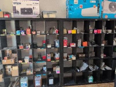 many boxes of electronics on the shelves in the store