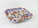 an image of a decorative bowl with flowers on it