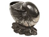 a black vase with a fish on it on a white background