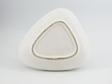 a white triangular shaped object with a thin line in the middle of it