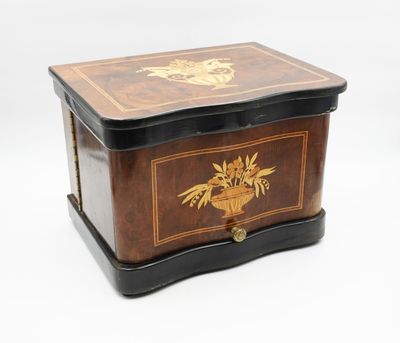 an image of a wooden box with a floral design on it