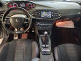 the interior of a car with a steering wheel and dashboard controls