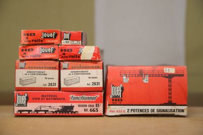 a stack of red boxes sitting on top of a table