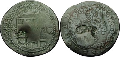 une pièce de monnaie en argent portant l'image d'un homme et d'une femme
