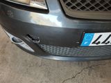 a close up of a car with a license plate on it