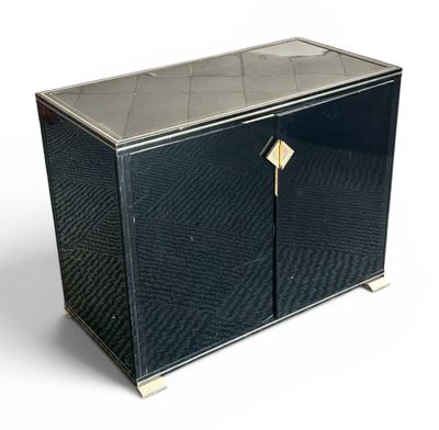 a small black cabinet with a mirror on the door
