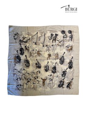 an image of a scarf with a bunch of animals on it