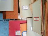 many folders that are sitting on the floor