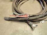 a hose that is sitting on the floor next to a hose