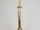 pair of brass and marble candlesticks on a marble base