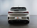 the rear end of a white suv parked in a white room