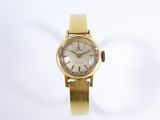 an image of a woman ' s wrist watch on a white background