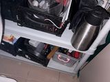 a shelf with a bunch of items on it