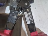 a pair of pliers that are sitting on a table