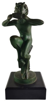 statue of a man with a gun in his hand on a black base