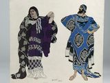 an image of two women dressed in traditional clothing, one in blue and the other in black