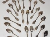 a lot of spoons and forks arranged in a circle