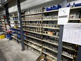 a room with a lot of tools on the shelves