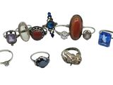 an assortment of assorted rings and rings on a white background