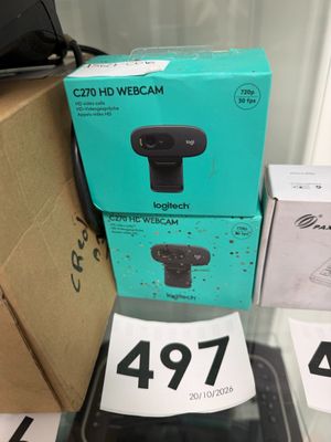 a box with a camera on top of it and a box with a phone on it