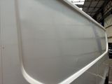 an image of a white truck in a garage