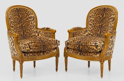 pair of leopard print armchairs in the style of louis ii