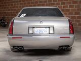 a silver car that is parked in a garage
