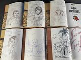 several pages of a book with drawings of people on them