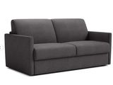 a gray couch with a black foot rest and a white background
