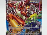 a close up of a pokemon card on a white surface