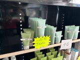 a shelf with many different types of skin care products on it
