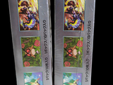 two boxes with pictures of pokemon characters on them