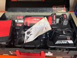 a tool box with tools in it sitting on a table