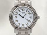 une montre en argent avec un cadran blanc, montée sur un bracelet