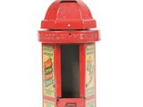 a small red box with a picture of a man on it