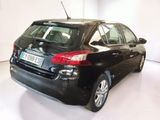 a picture of a black car parked in a white room
