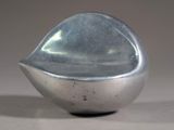 a silver object that is sitting on a table