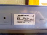 a label on the side of a dishwasher that says sandblast cabinet